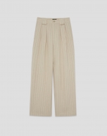 Beige pleated trousers with black pinstripes