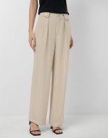 Beige pleated trousers with black pinstripes