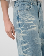 Blue wide-leg jeans with jacquard and faded effect