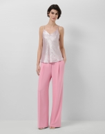 Sleeveless top in glittery laminated fabric in pink