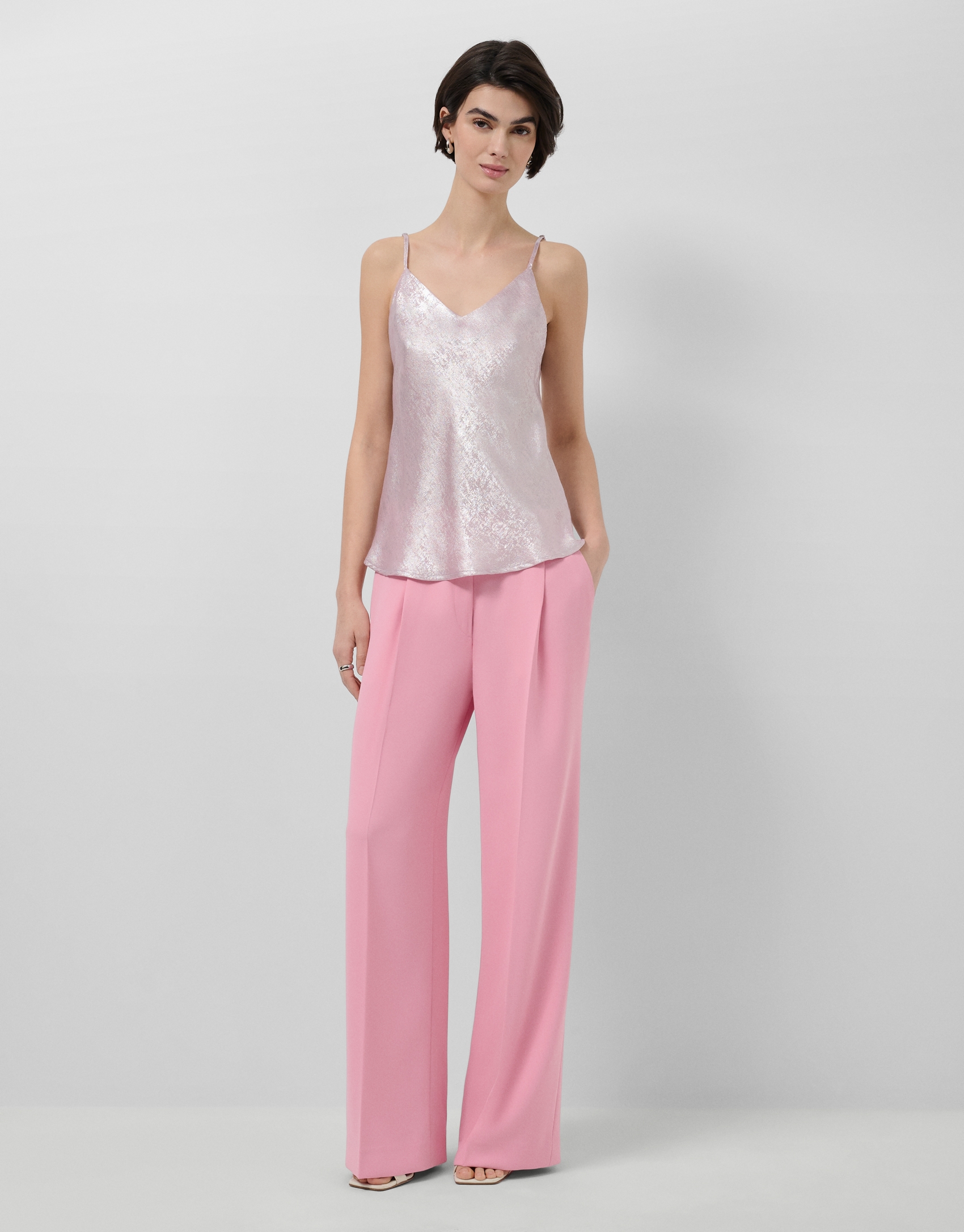 Top sisas tejido laminado brillo rosa