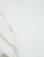 Ecru short-sleeved blouse with ruffles