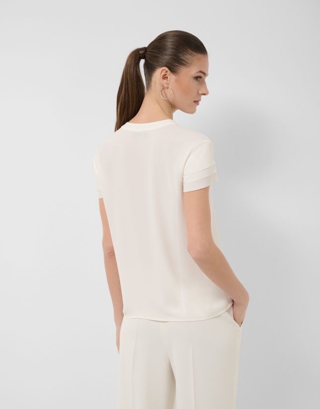 Blusa manga corta con volantes crudo