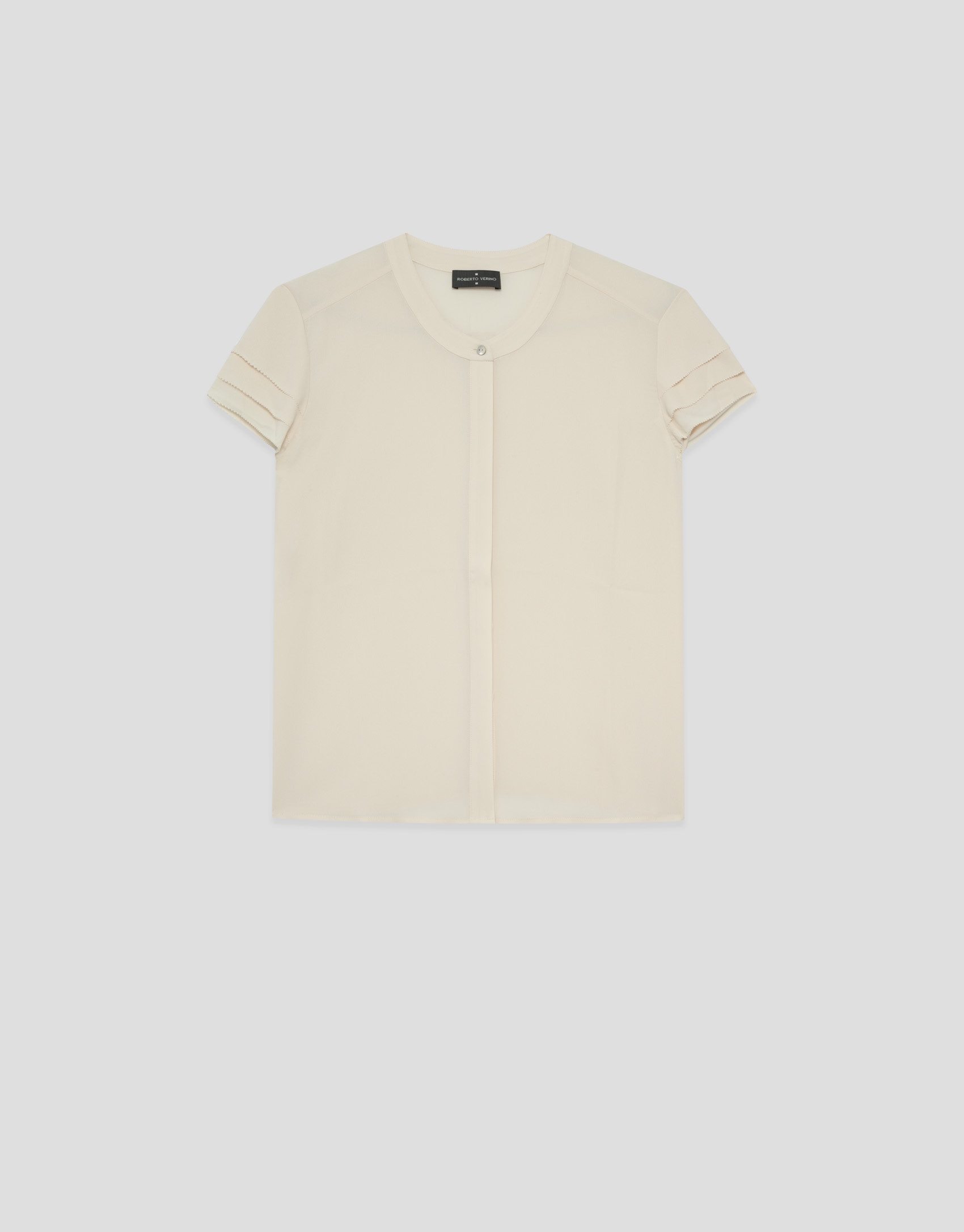 Blusa manga corta con volantes c&aacute;mel