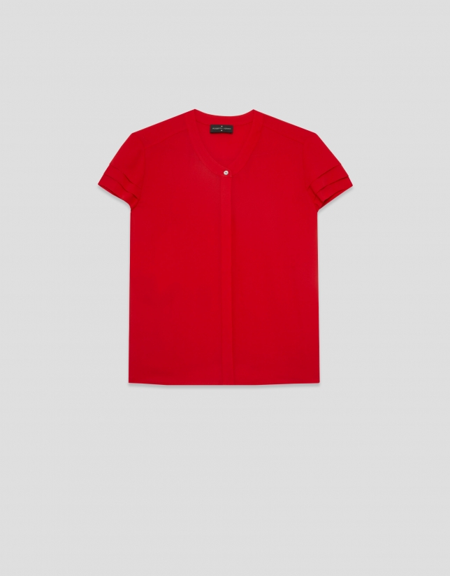 Red short-sleeved blouse with ruffles