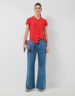 Red short-sleeved blouse with ruffles