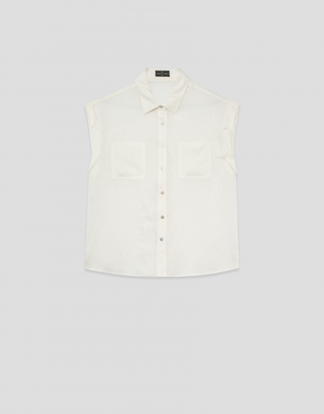 Ecru sleeveless blouse with pockets