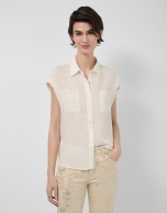 Ecru sleeveless blouse with pockets