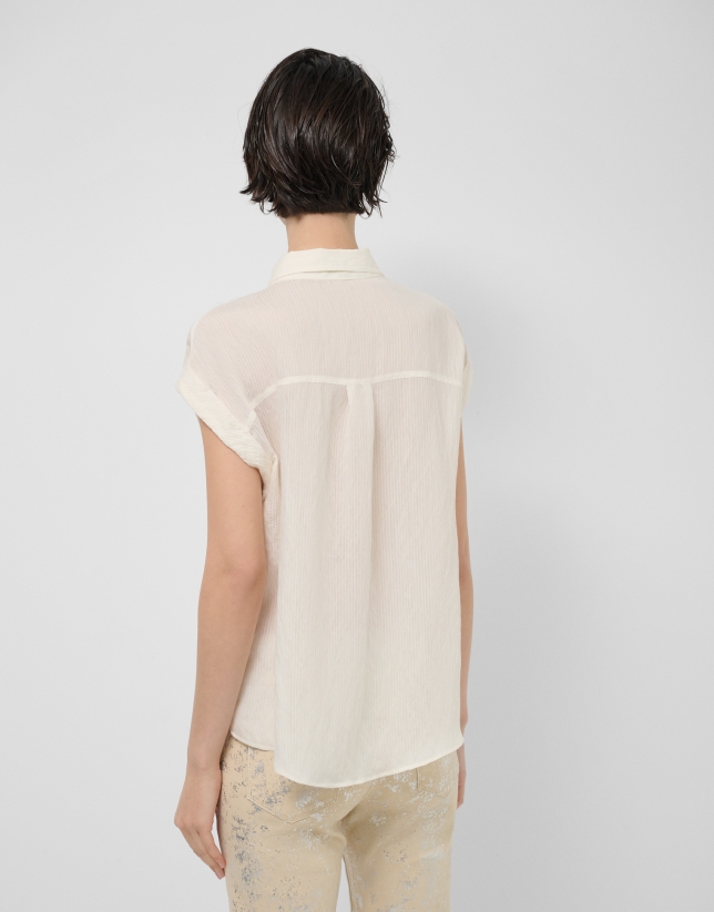 Ecru sleeveless blouse with pockets