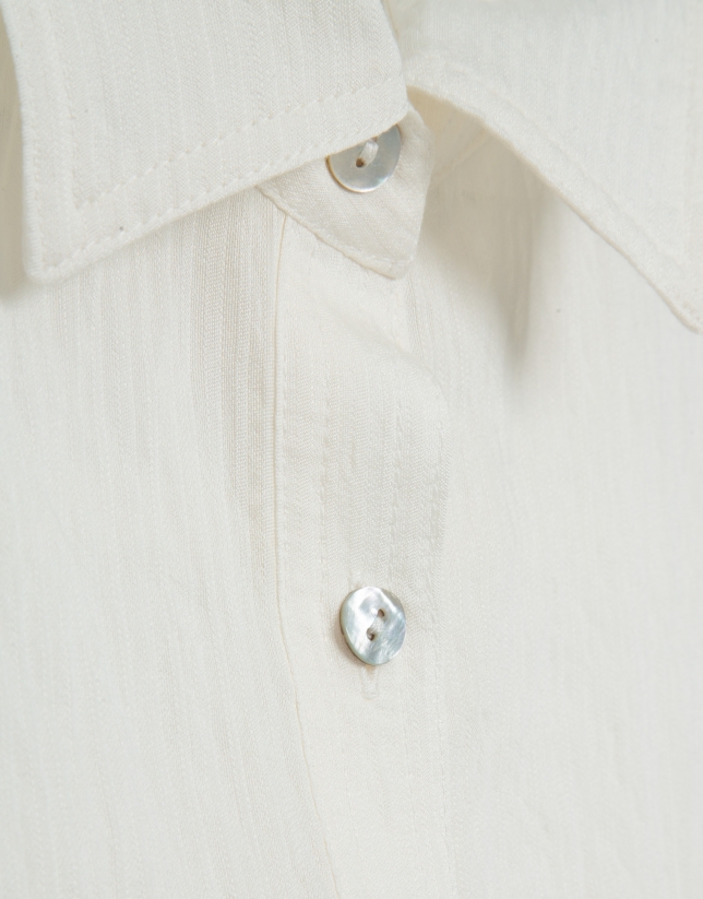 Ecru sleeveless blouse with pockets