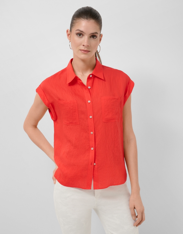 Blusa sin mangas y con bolsillos rojo