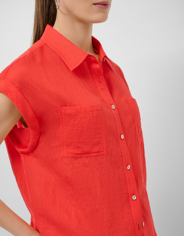 Blusa sin mangas y con bolsillos rojo