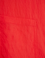 Sleeveless blouse with pockets in red