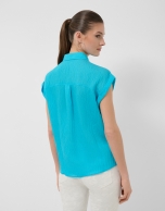 Turquoise sleeveless blouse with pockets