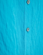 Turquoise sleeveless blouse with pockets