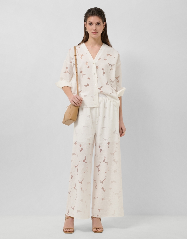 Oversized white devor&eacute; blouse with floral print