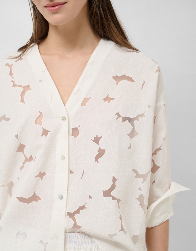 Oversized white devor&eacute; blouse with floral print