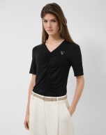 Black short-sleeved T-shirt with draping
