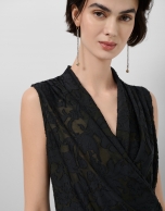 Black devor&eacute; knit crossover sleeveless T-shirt