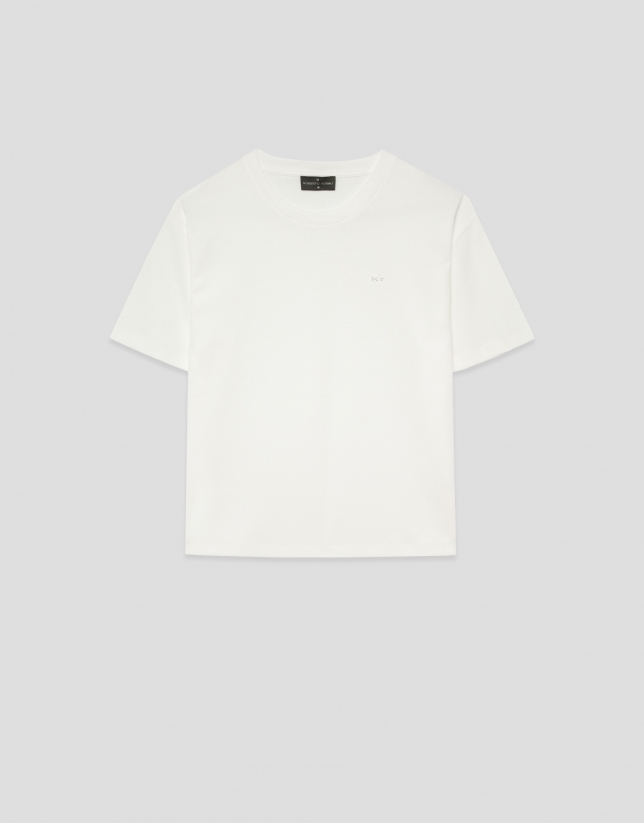White oversized T-shirt with rhinestones on the chest