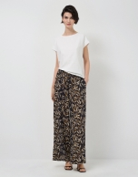 Oversized white sleeveless T-shirt with floral embroidery