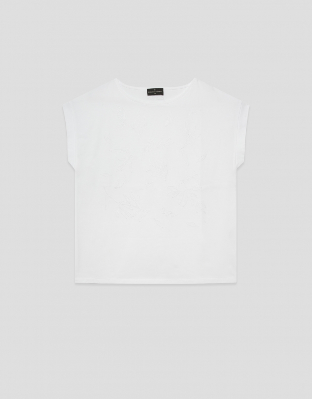 Oversized white sleeveless T-shirt with floral embroidery
