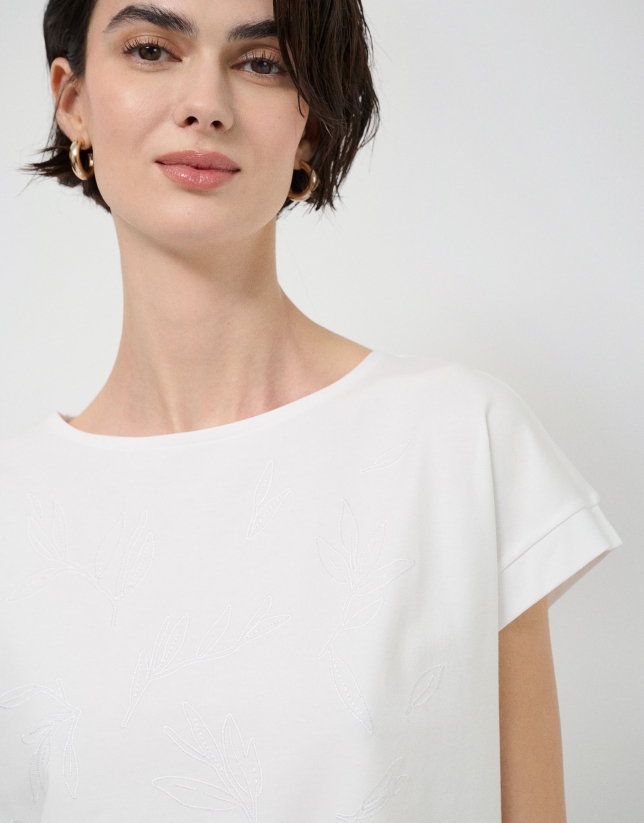 White oversized sleeveless t-shirt with floral embroidery