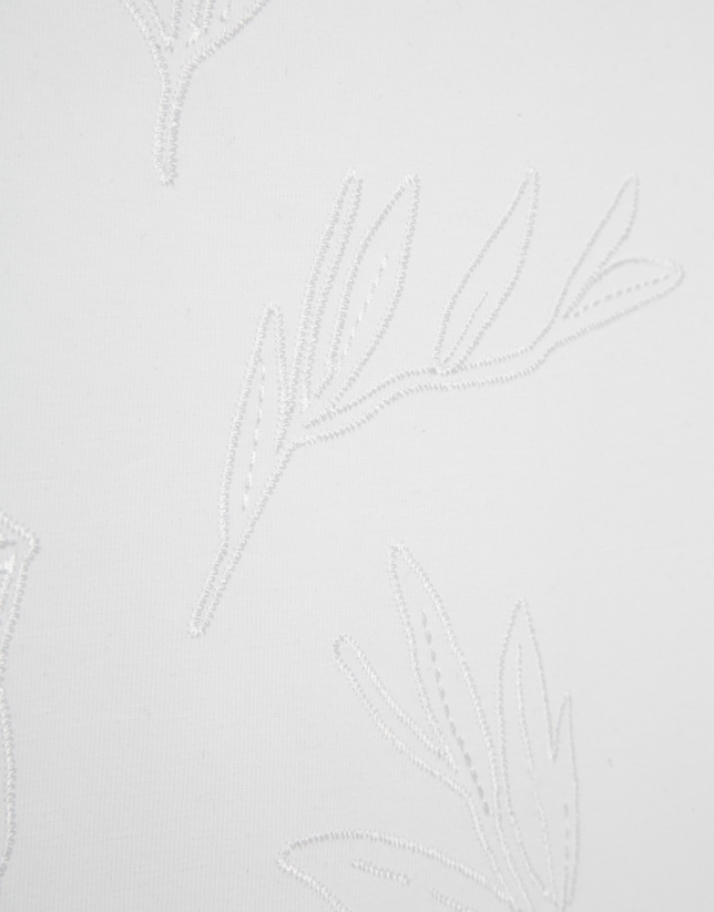 White oversized sleeveless t-shirt with floral embroidery