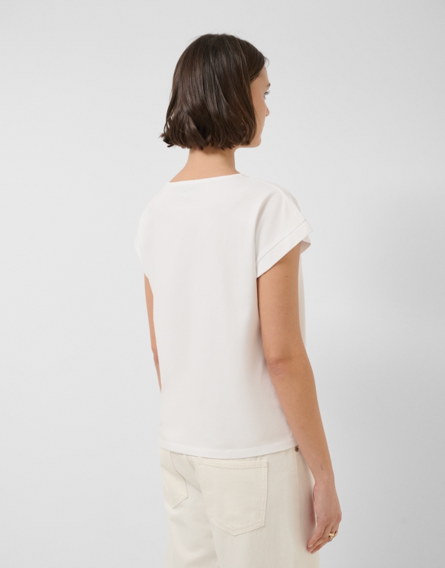 Camiseta sin mangas oversize blanca con estrellas y hojas