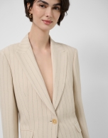 Beige one-button blazer with black pinstripe