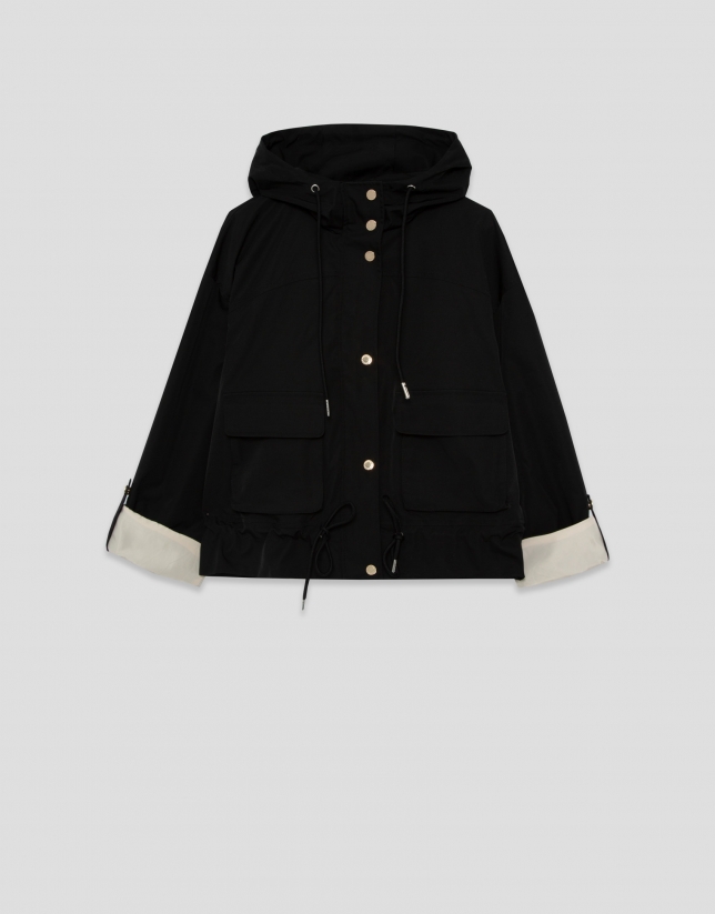 Cazadora tejido t&eacute;cnico negro interior c&aacute;mel