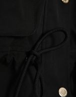 Black technical fabric jacket with camel interior