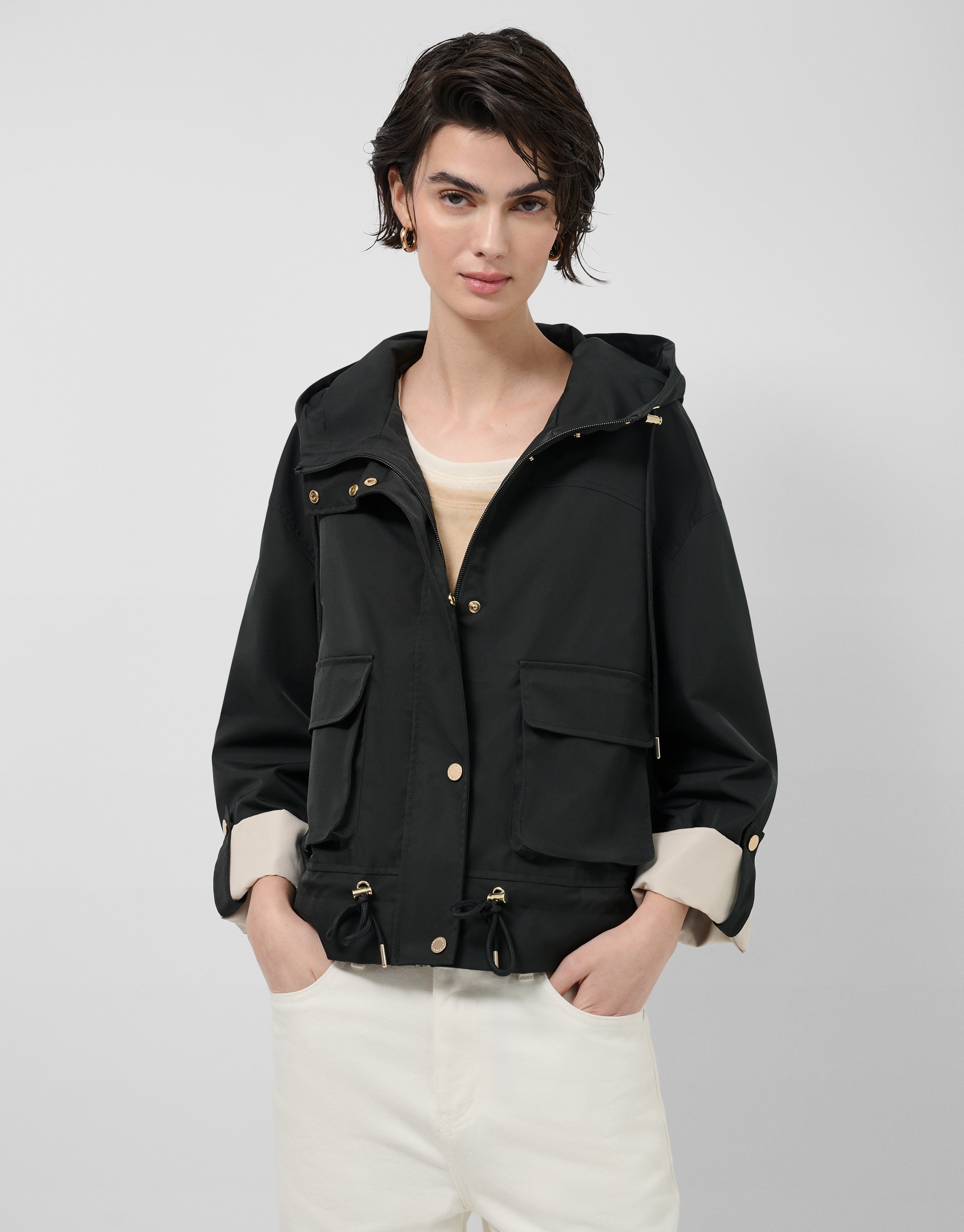 Black technical fabric jacket with camel interior