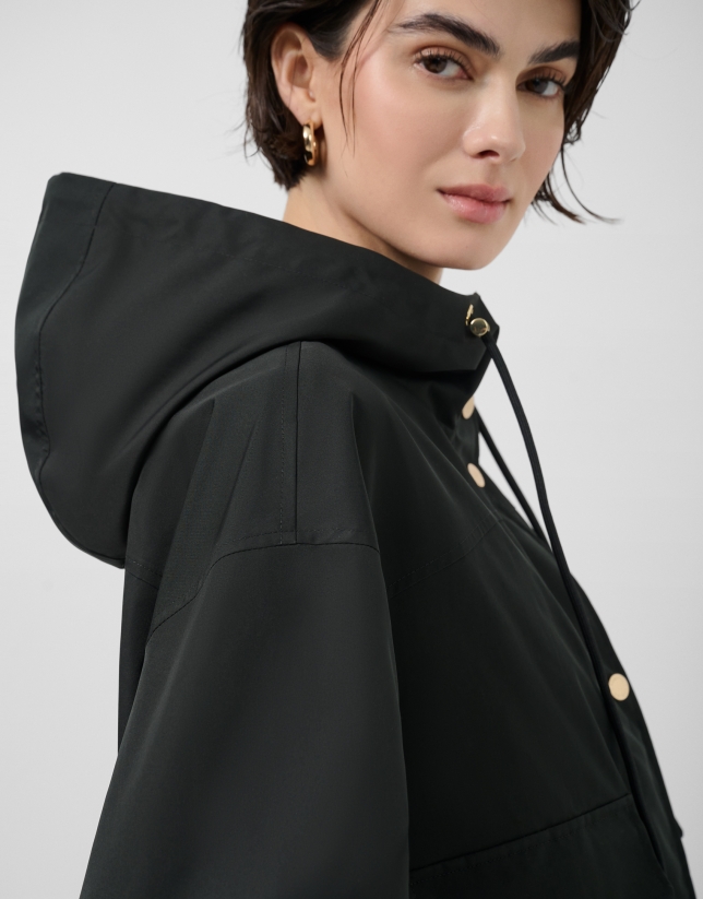 Cazadora tejido t&eacute;cnico negro interior c&aacute;mel