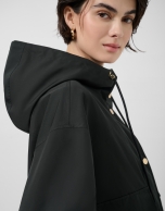 Black technical fabric jacket with camel interior