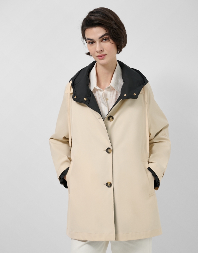 Reversible trench coat in camel/black