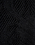 Chaqueta larga negra con calados florales