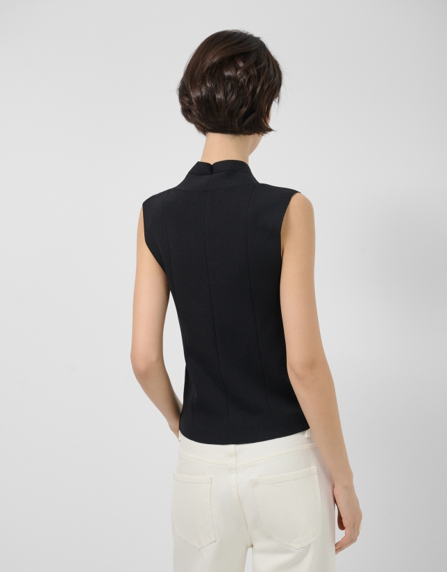 Black V-neck top in plain knit
