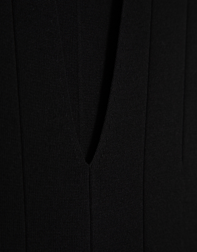 Black V-neck top in plain knit