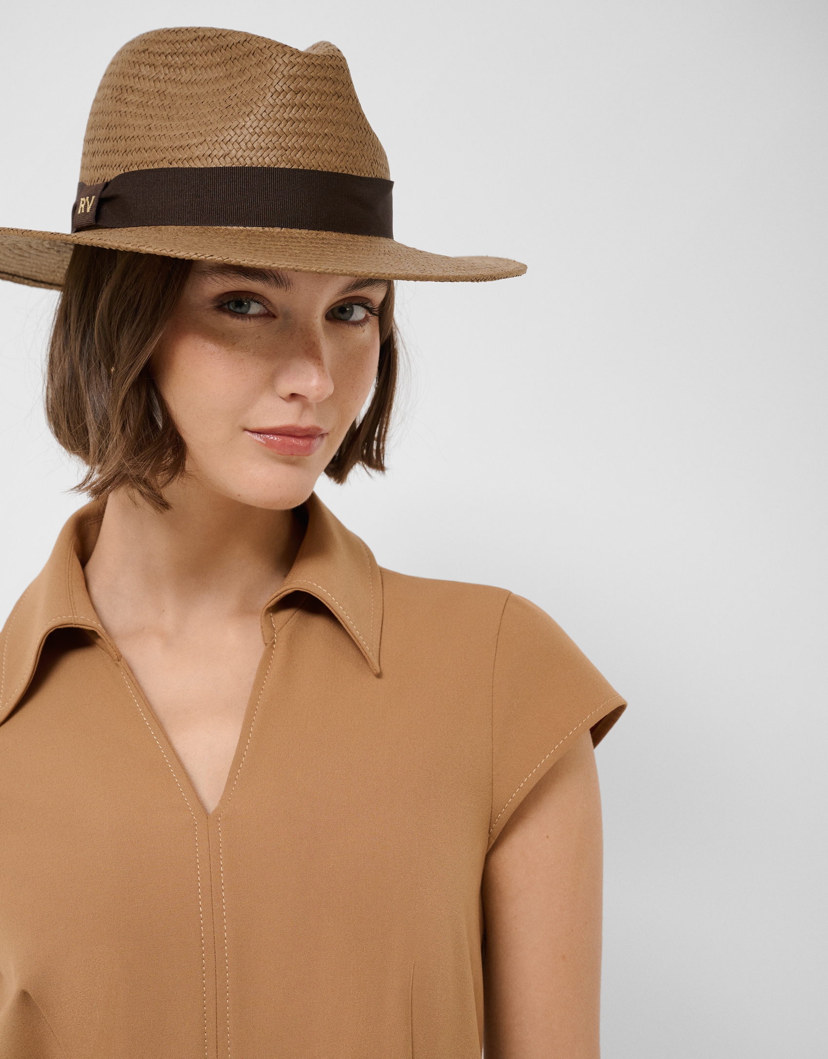 Toasted plant fibre hat with brown ribbon