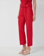 Straight-leg trousers in red floral piqu&eacute;