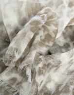Scarf made from a blend of cotton, modal and linen with an animal print in beige tones