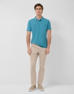 Blue-green short-sleeved piqu&eacute; polo shirt