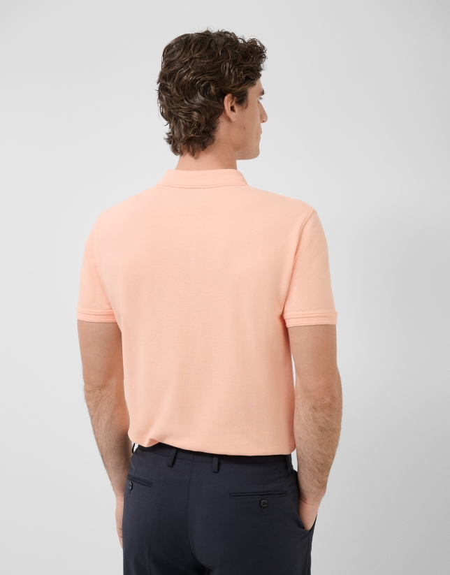 Polo piqu&eacute; de manga corta naranja claro