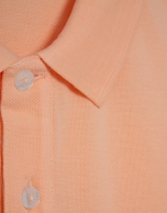 Polo piqu&eacute; de manga corta naranja claro