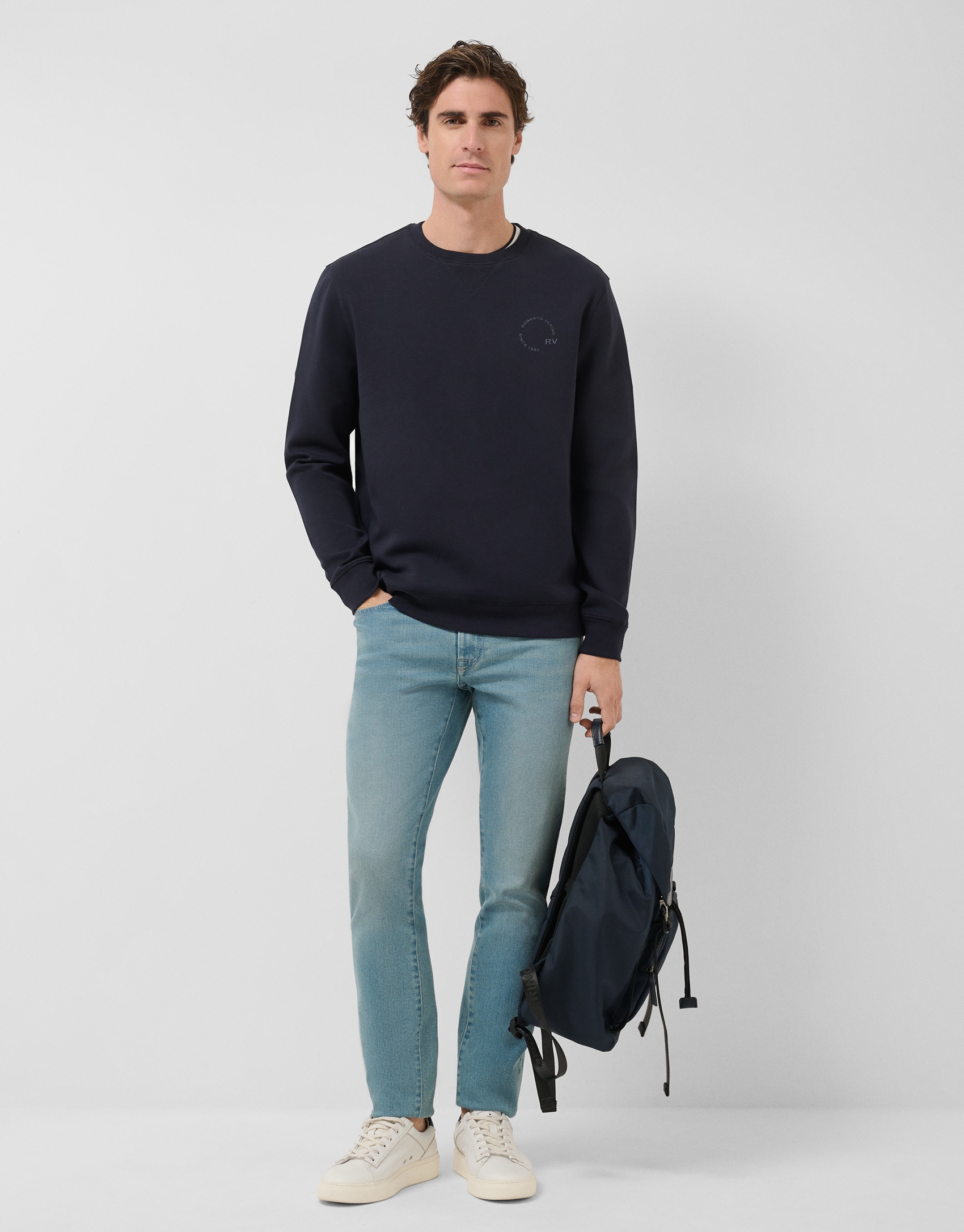 Navy sweatshirt with matching logo on chest