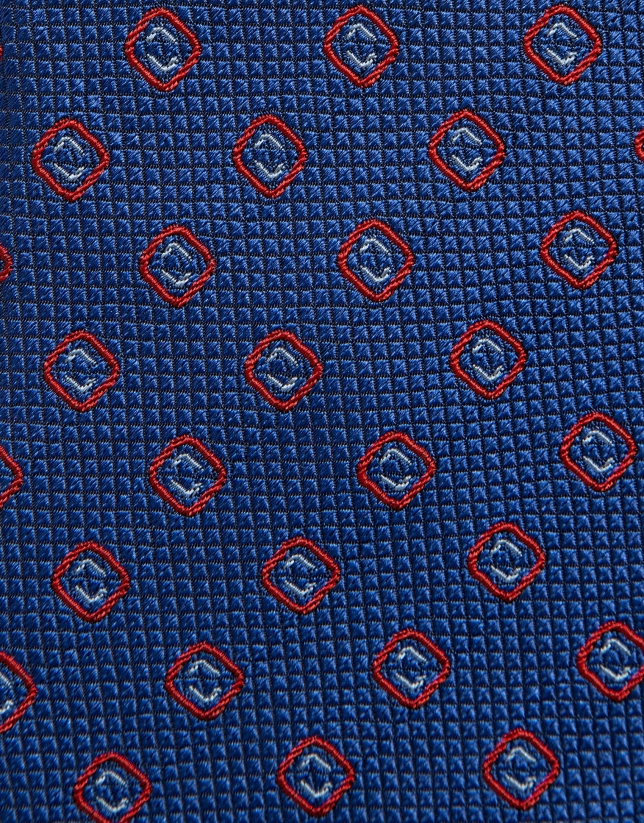 Blue silk tie with red and light blue geometric jacquard