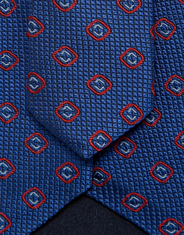 Blue silk tie with red and light blue geometric jacquard