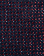 Navy silk tie with red geometric jacquard pattern