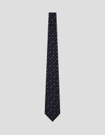 Navy silk tie with red/white geometric jacquard pattern